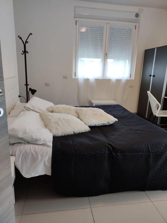 Postel nebo postele na pokoji v ubytování BeB Casa di Lia