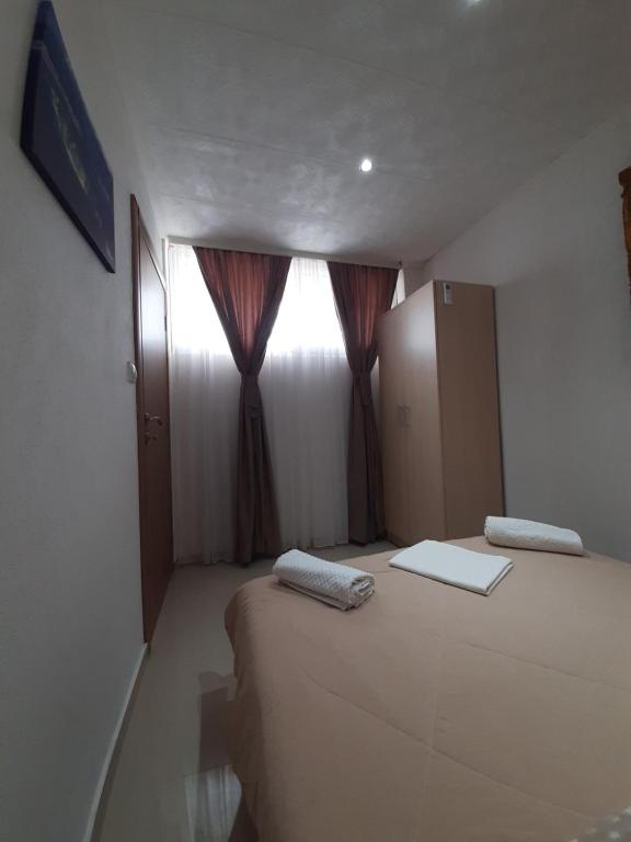 Postel nebo postele na pokoji v ubytování Becic Apartments
