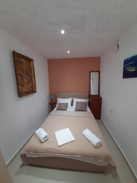 Postel nebo postele na pokoji v ubytování Becic Apartments