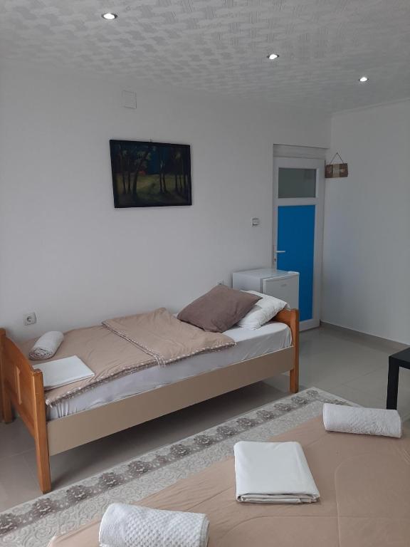 Postel nebo postele na pokoji v ubytování Becic Apartments