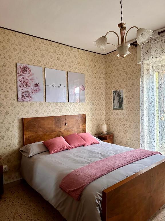 Postel nebo postele na pokoji v ubytování Affittacamere La Dimora dei Nonni