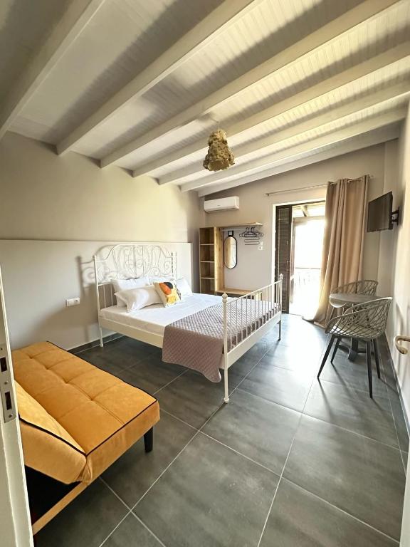 Ένα ή περισσότερα κρεβάτια σε δωμάτιο στο Room Nine 9 Beachfront Apartments