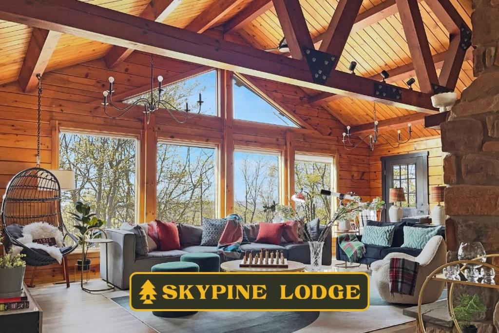 a large living room with a sky swing lodge at Skypine Lodge - Log Lodge Atop the World in Jim Thorpe