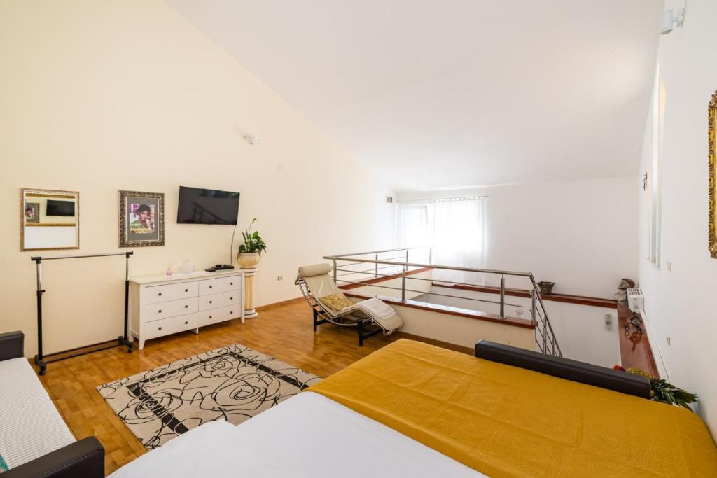 Łóżko lub łóżka w pokoju w obiekcie Resort Villa Moses