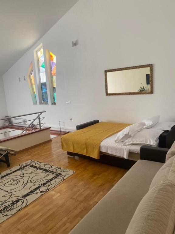 Łóżko lub łóżka w pokoju w obiekcie Resort Villa Moses