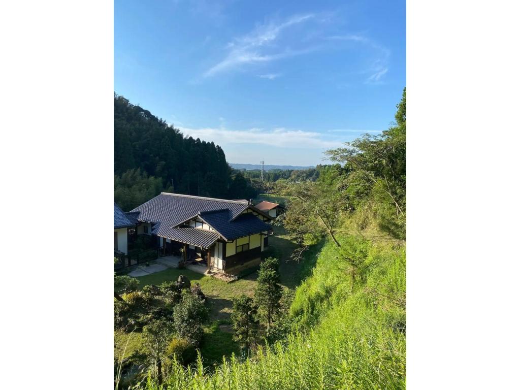 an aerial view of a house on a hill at Nanakuniyama Minka - Vacation STAY 37250v in Isumi