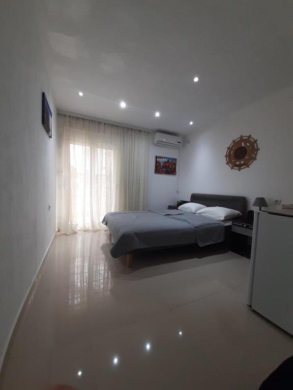 Postel nebo postele na pokoji v ubytování Becic Apartments