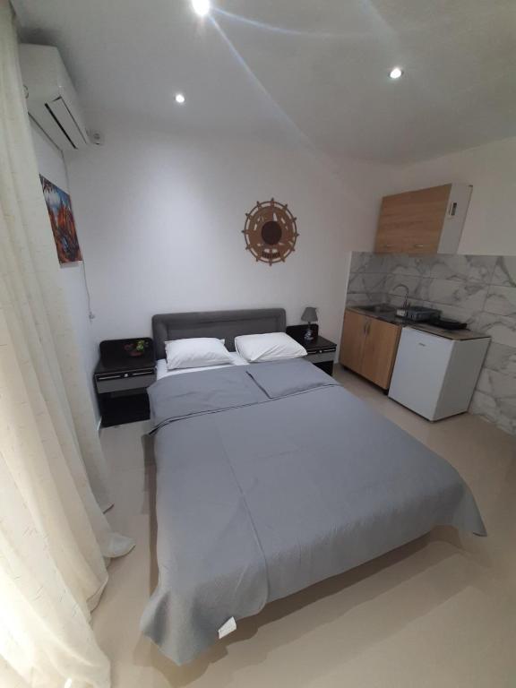 Postel nebo postele na pokoji v ubytování Becic Apartments