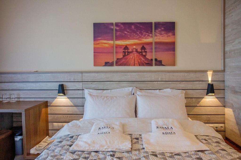 Postel nebo postele na pokoji v ubytování Kavala Resort & Spa