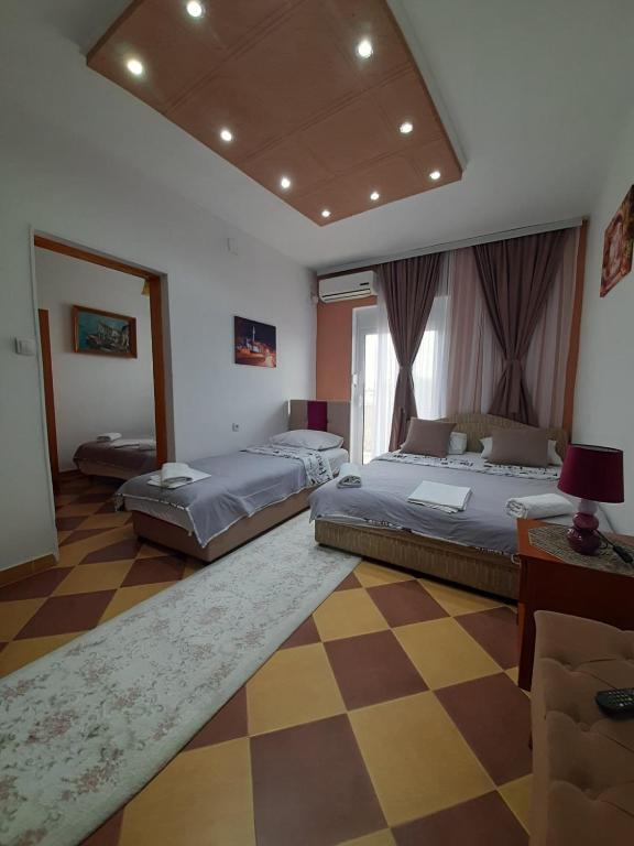 Postel nebo postele na pokoji v ubytování Becic Apartments