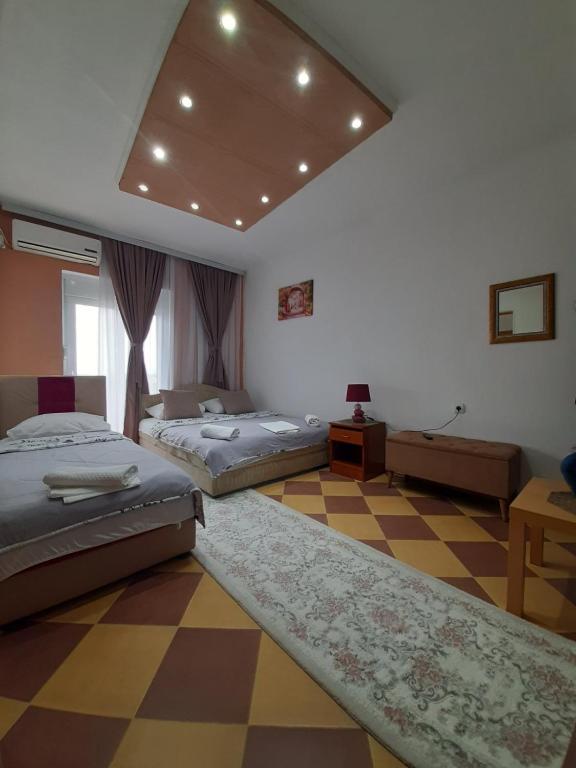 Postel nebo postele na pokoji v ubytování Becic Apartments