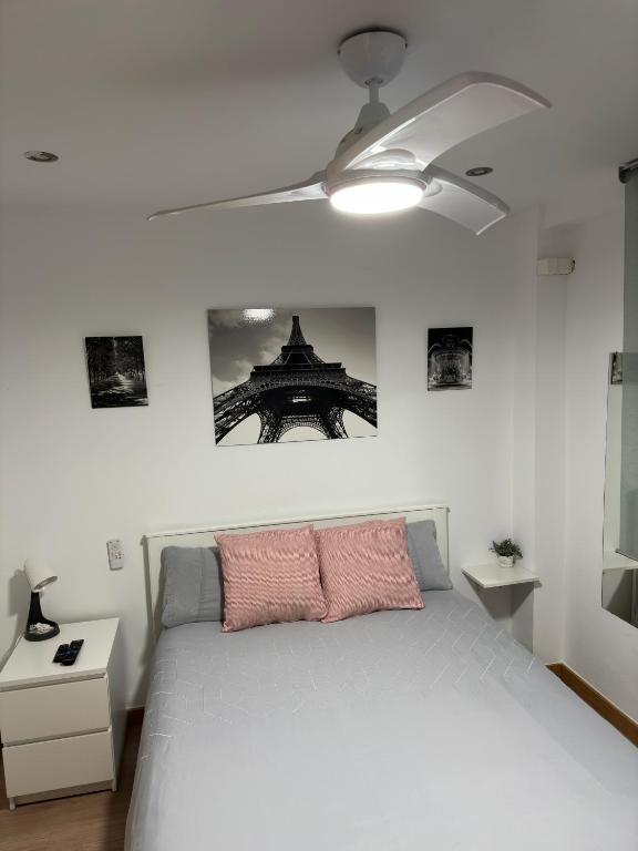 Posteľ alebo postele v izbe v ubytovaní Manrique Rooms