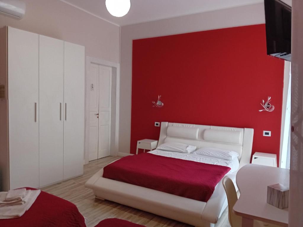 Postel nebo postele na pokoji v ubytování B&B Domus Palmi