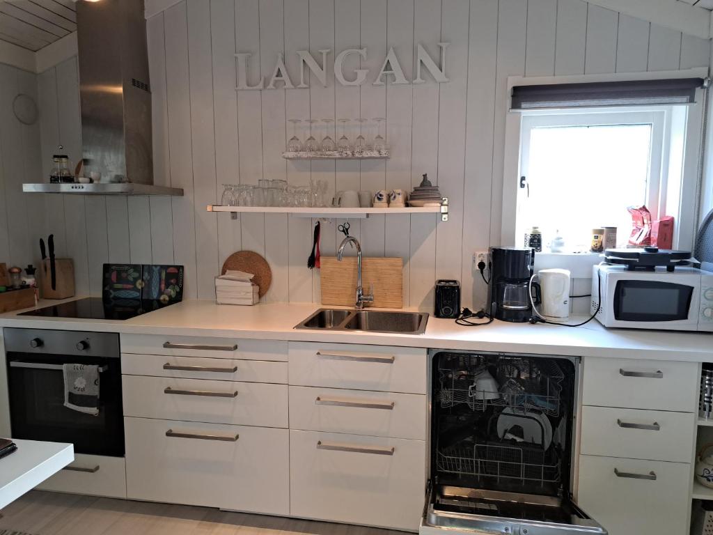 Kuchyň nebo kuchyňský kout v ubytování Cottage Langan