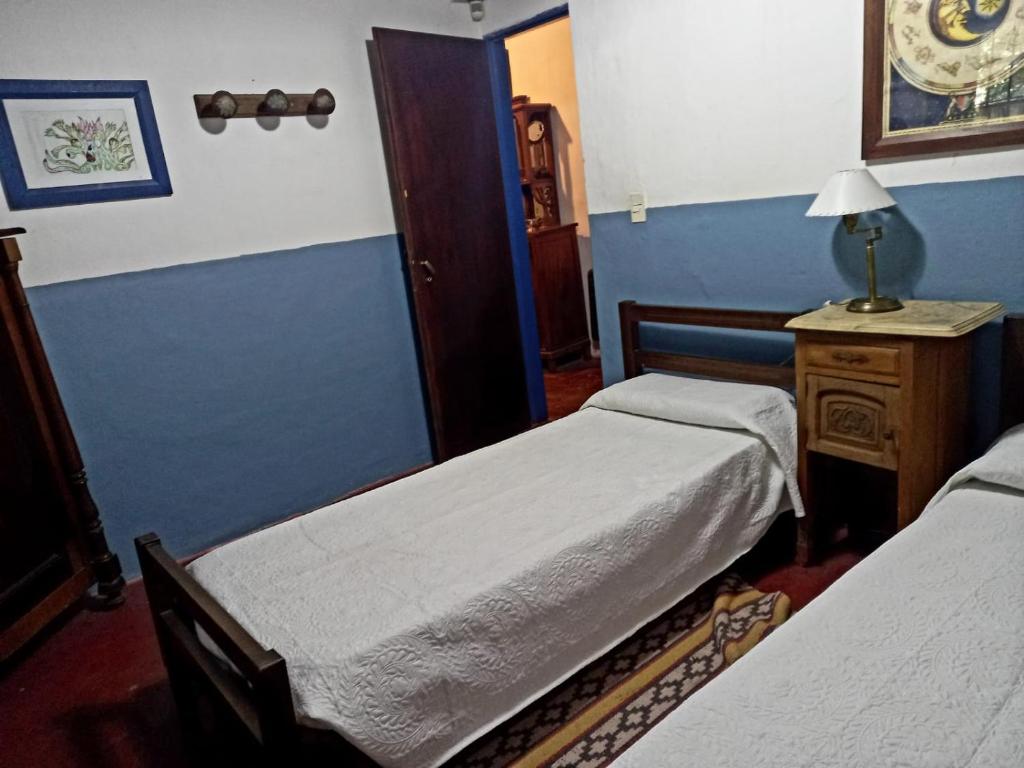 Postel nebo postele na pokoji v ubytování Hotel Posada El Recodo