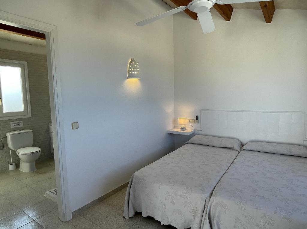 Postel nebo postele na pokoji v ubytování Villa Miguel