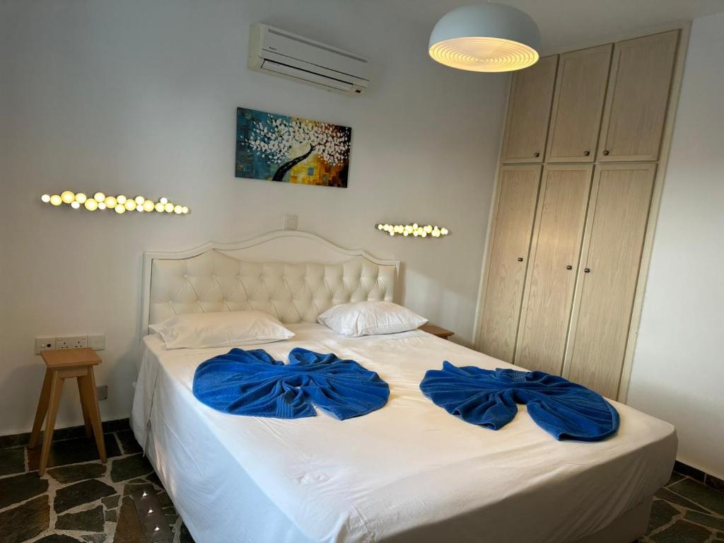 Postel nebo postele na pokoji v ubytování Tasmaria Aparthotel
