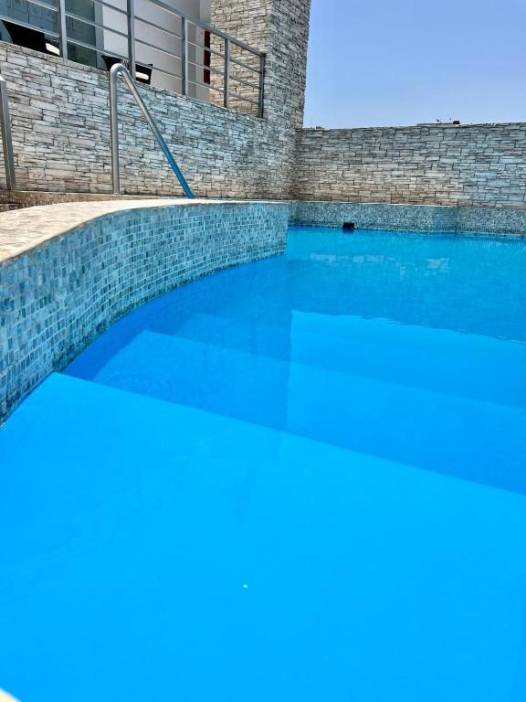 Bazén v ubytování Sol de Oro Hotel & Suites nebo v jeho okolí