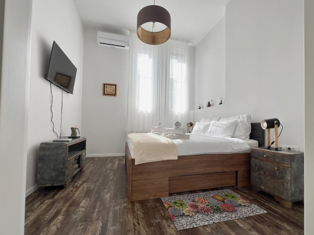 Postel nebo postele na pokoji v ubytování Zagreb Industrial Charm 1 & 2
