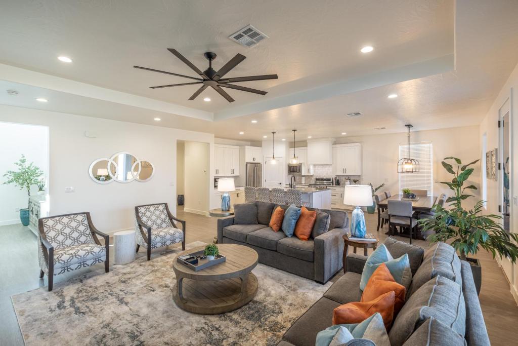 a living room with a couch and a table at Casa Ledges in Ivins