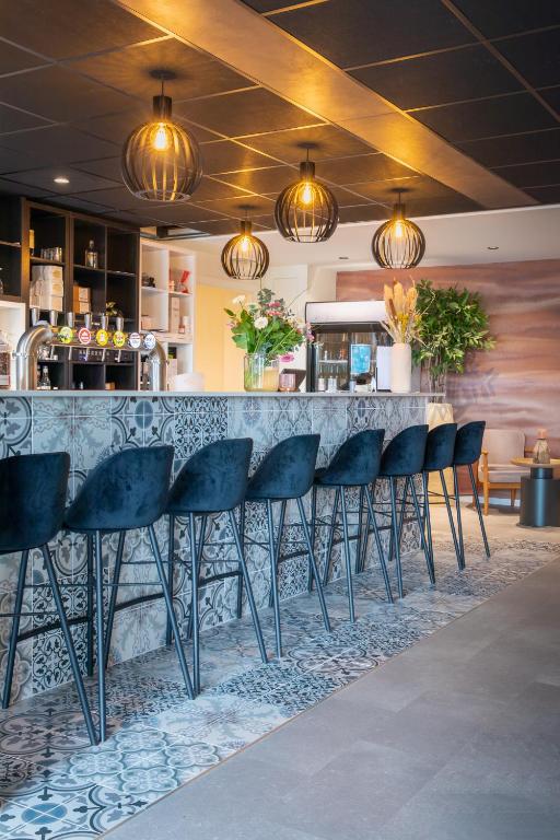 Lounge nebo bar v ubytování Dune Hotel Nieuwpoort