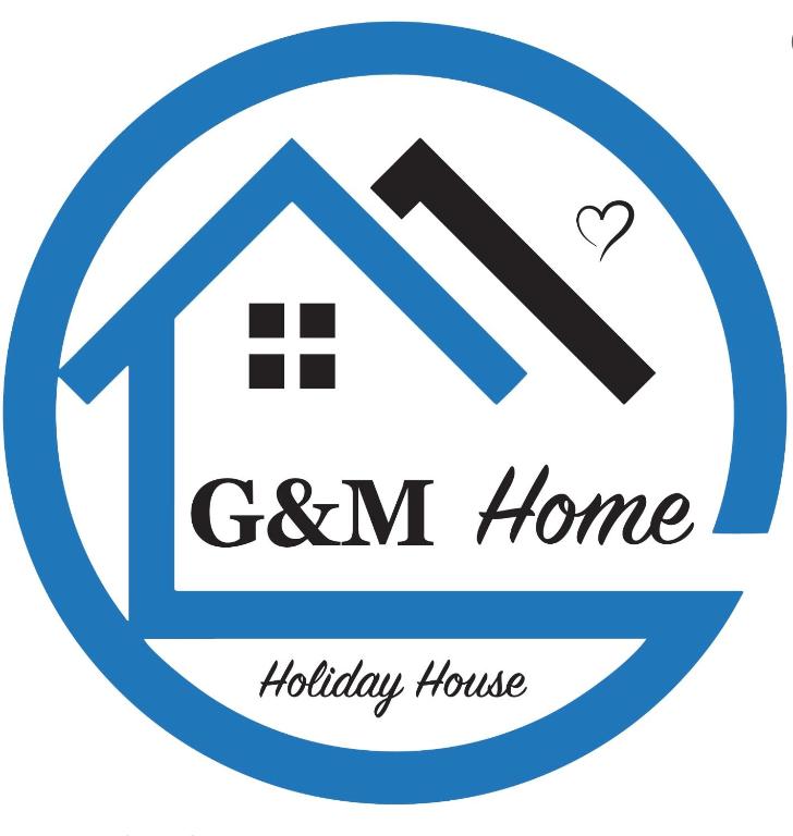a label for a house with a heart and the words gm home at G&M Home in Castellana Grotte