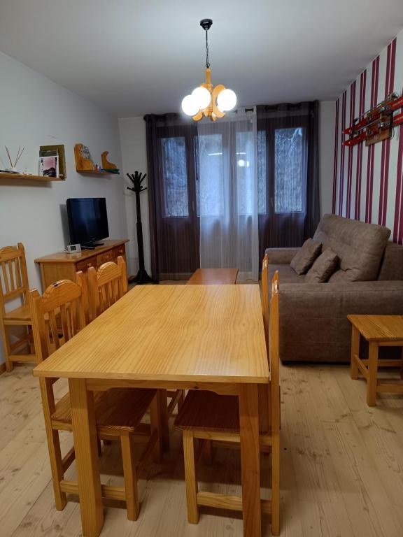 TV a/nebo společenská místnost v ubytování Apartamento Viman