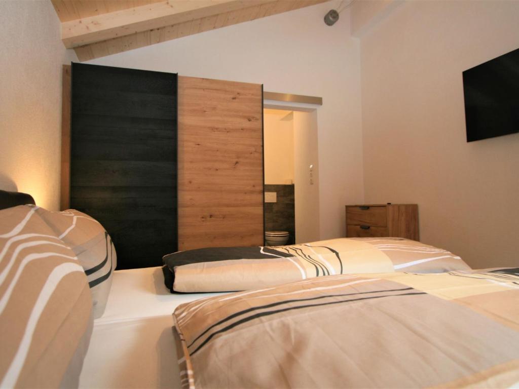 Postel nebo postele na pokoji v ubytování Apartment Johann by Interhome