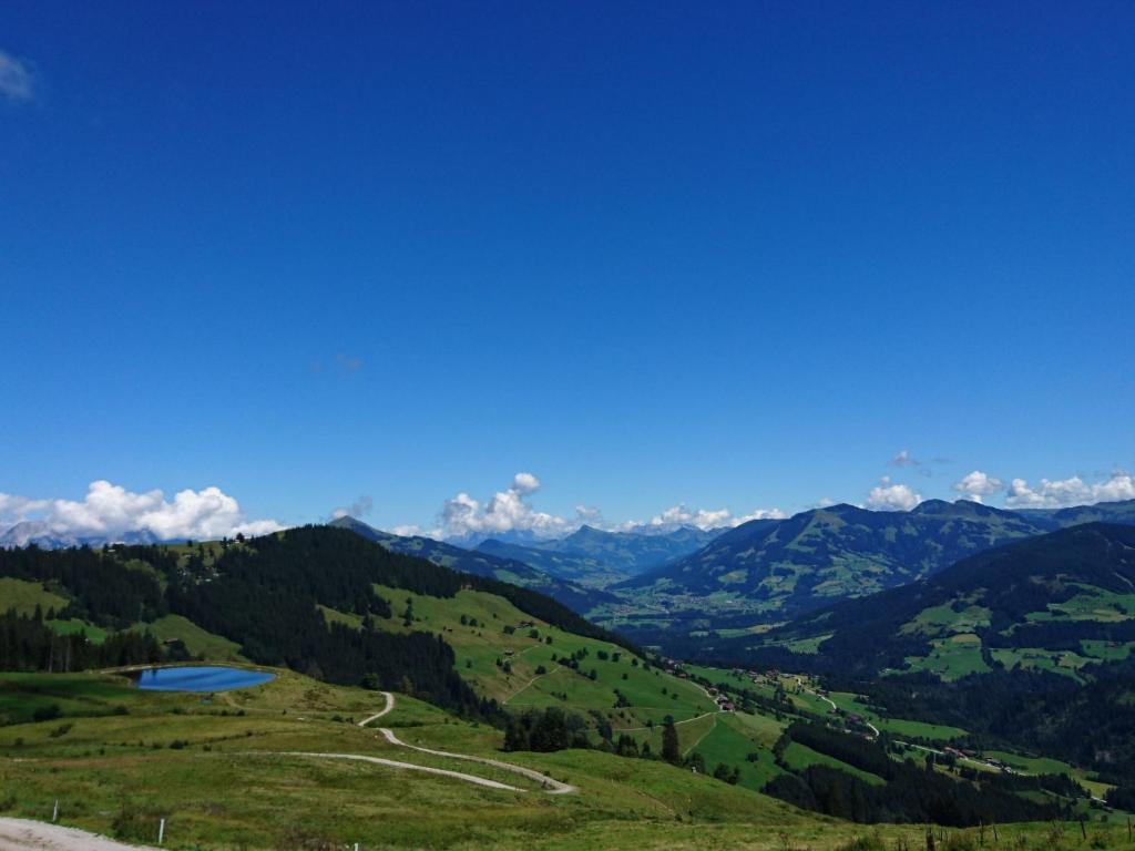 a view of a valley from the top of a mountain at Apartment Alpboden-3 by Interhome in Auffach