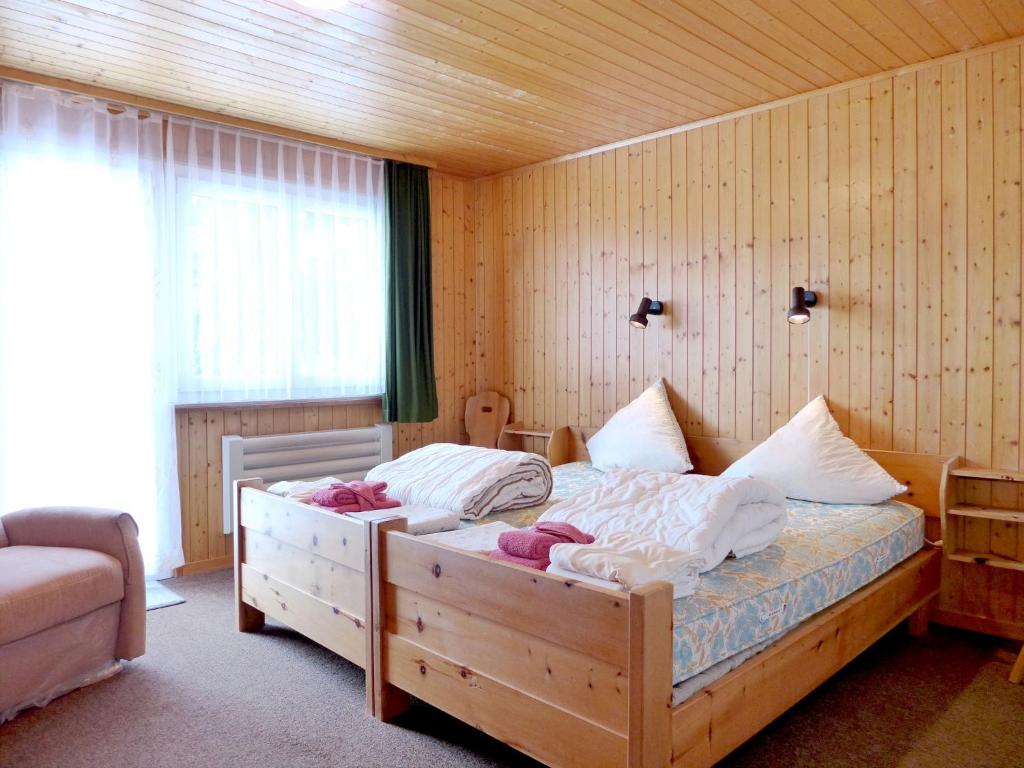 Postel nebo postele na pokoji v ubytování Chalet Chalet Larix by Interhome