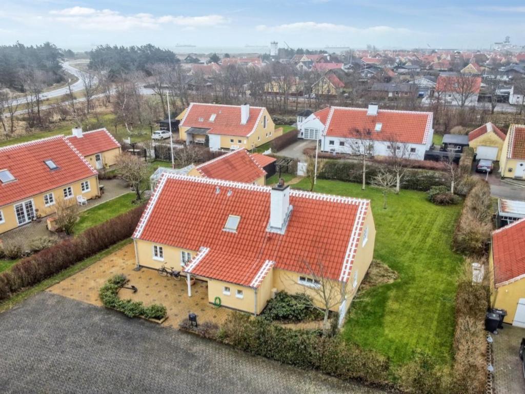 an aerial view of houses with red roofs at Holiday Home Kringfod - 750m from the sea in NW Jutland by Interhome in Skagen