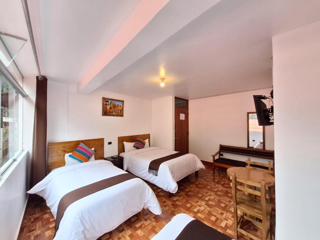 Postel nebo postele na pokoji v ubytování Mapi Gardens Machupicchu B&B