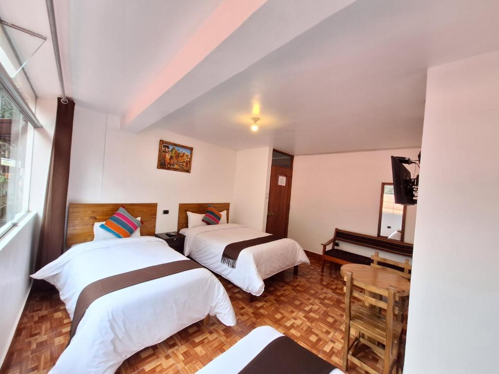 Postel nebo postele na pokoji v ubytování Mapi Gardens Machupicchu B&B