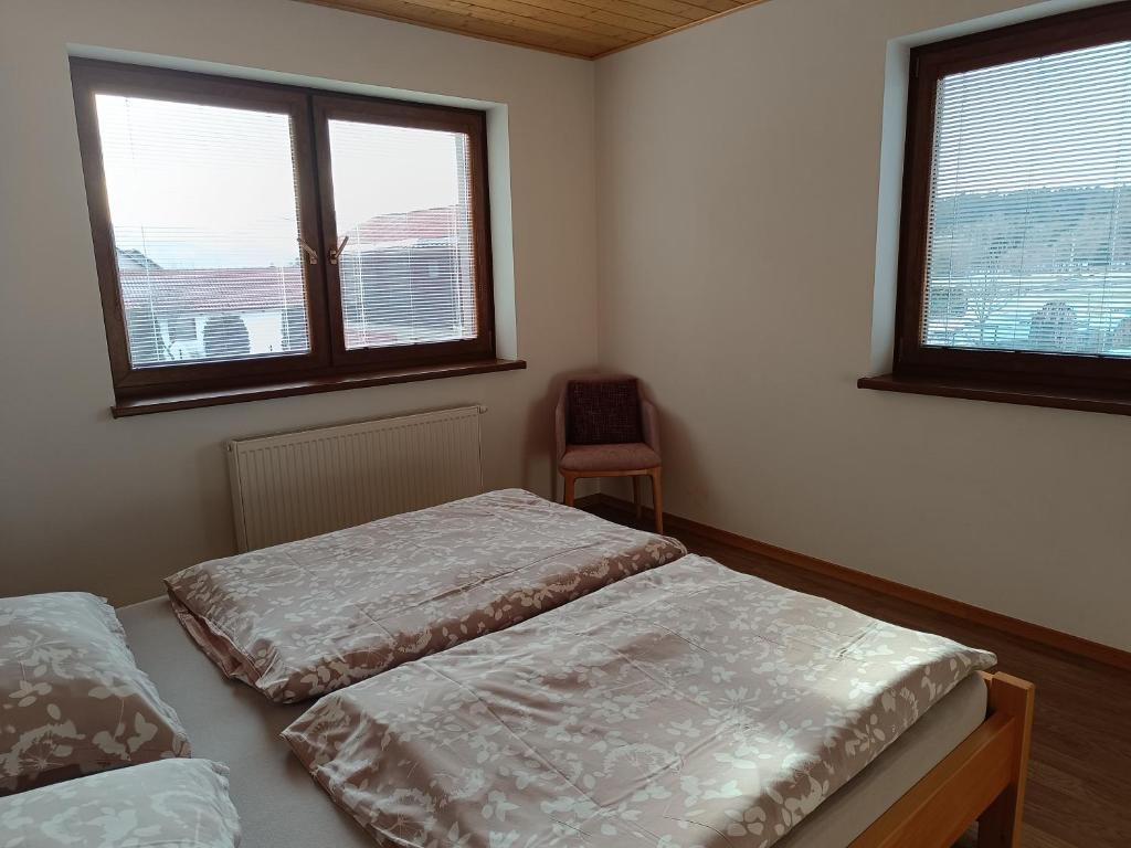 Posteľ alebo postele v izbe v ubytovaní Tatry TOP Dom