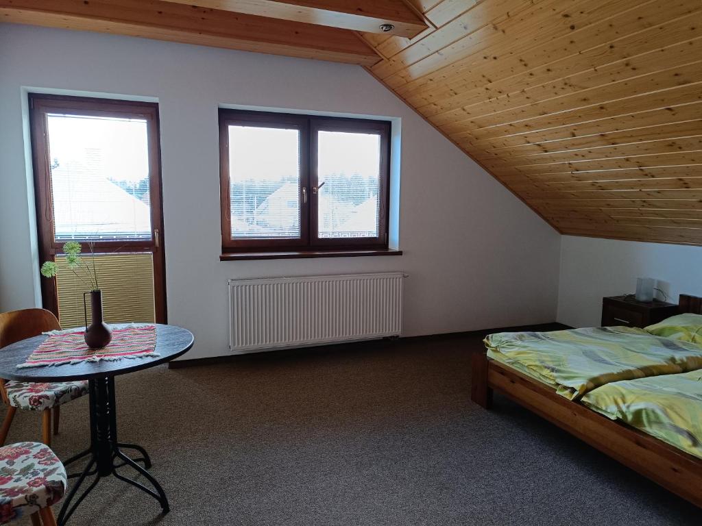 Posteľ alebo postele v izbe v ubytovaní Tatry TOP Dom