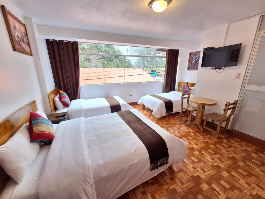 Postel nebo postele na pokoji v ubytování Mapi Gardens Machupicchu B&B