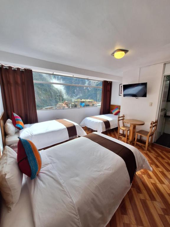 Postel nebo postele na pokoji v ubytování Mapi Gardens Machupicchu B&B