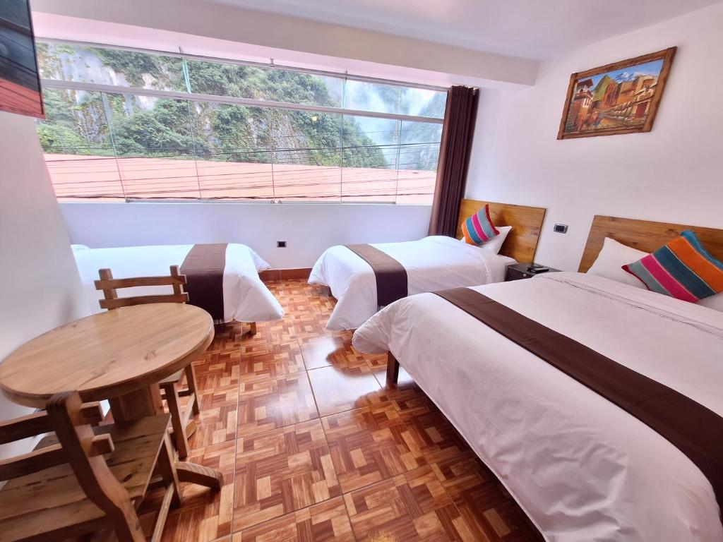 Postel nebo postele na pokoji v ubytování Mapi Gardens Machupicchu B&B