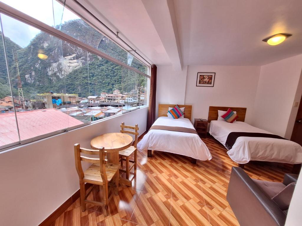 Postel nebo postele na pokoji v ubytování Mapi Gardens Machupicchu B&B