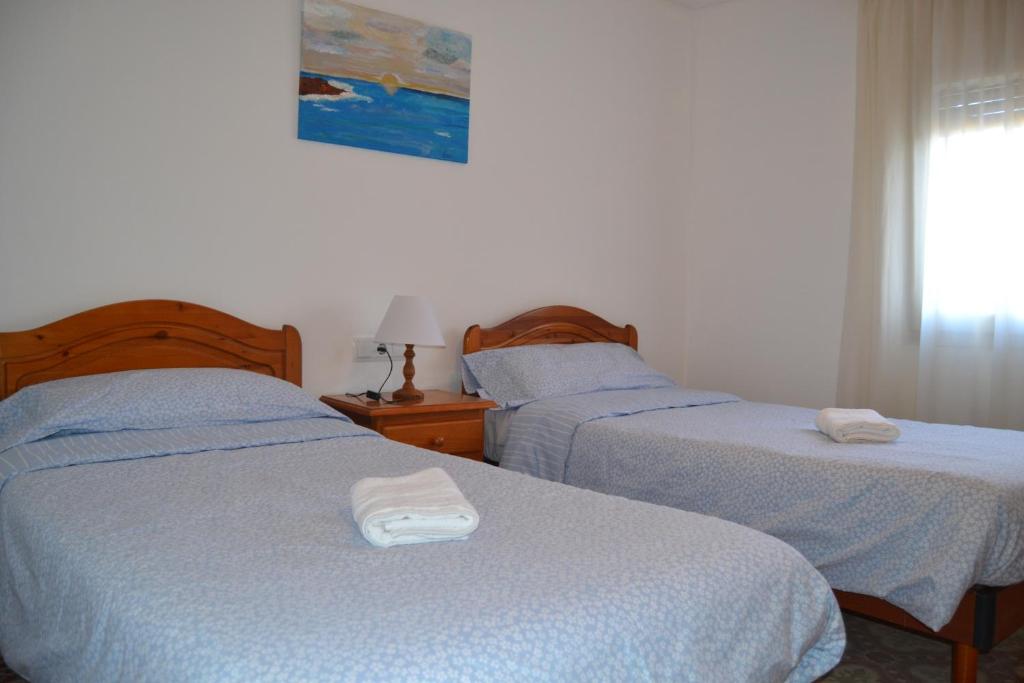 Postel nebo postele na pokoji v ubytování Casa Cal Tòfol