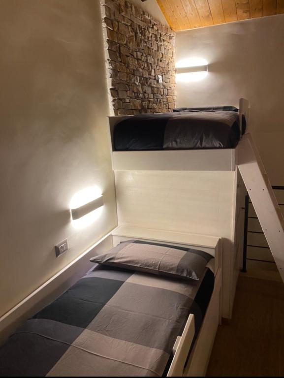 Postel nebo postele na pokoji v ubytování DOLCE VITA