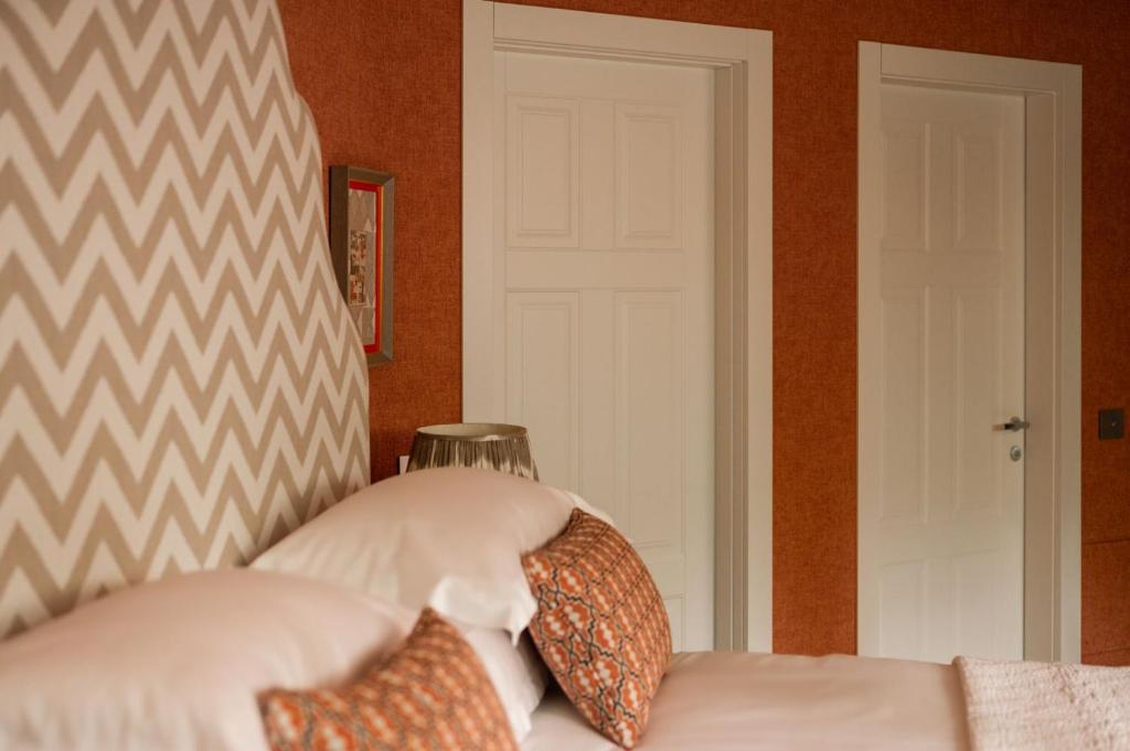 A bed or beds in a room at Vmaison Brera Milano