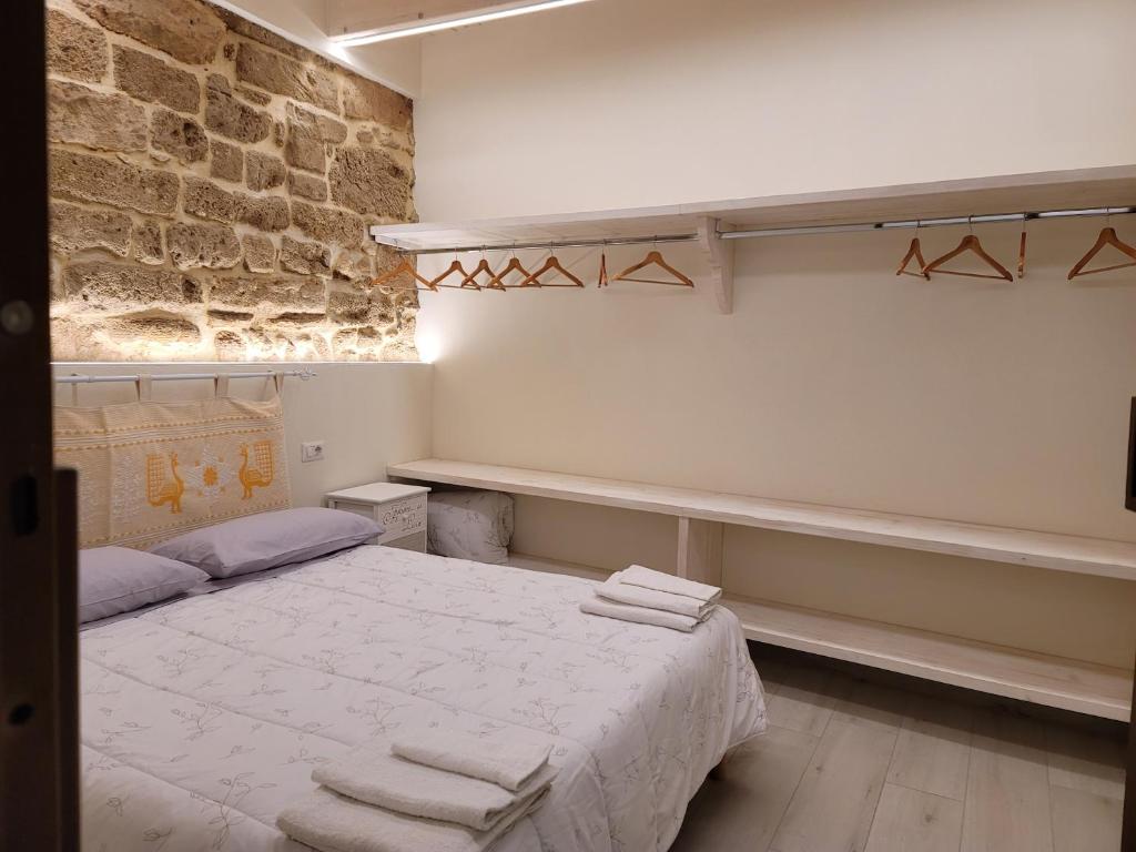 Postel nebo postele na pokoji v ubytování Paradiso di Maiorca