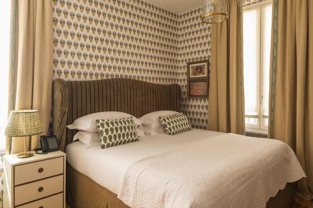 A bed or beds in a room at Vmaison Brera Milano