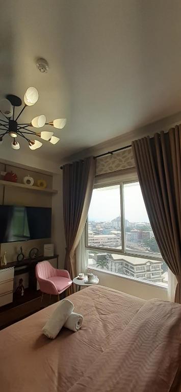 Postel nebo postele na pokoji v ubytování Studio-Type Condotel Mesatierra Garden Residences
