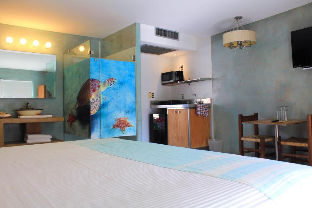 Kuchyň nebo kuchyňský kout v ubytování Hotel Rio Malecon