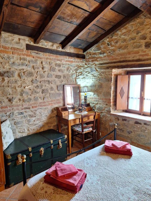 Posteľ alebo postele v izbe v ubytovaní Agriturismo Ristoro del Cavaliere