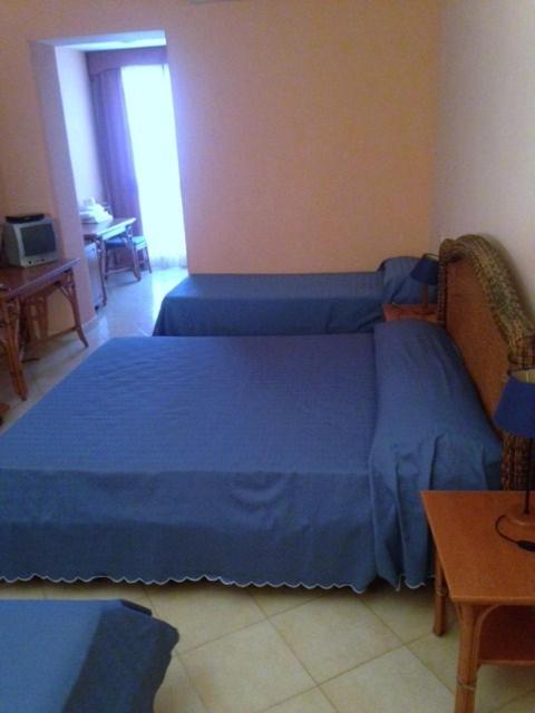 Postel nebo postele na pokoji v ubytování B Palace