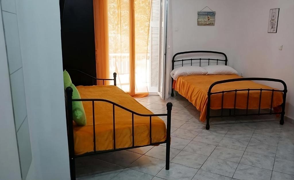 Posteľ alebo postele v izbe v ubytovaní Dream Acropolis Flat
