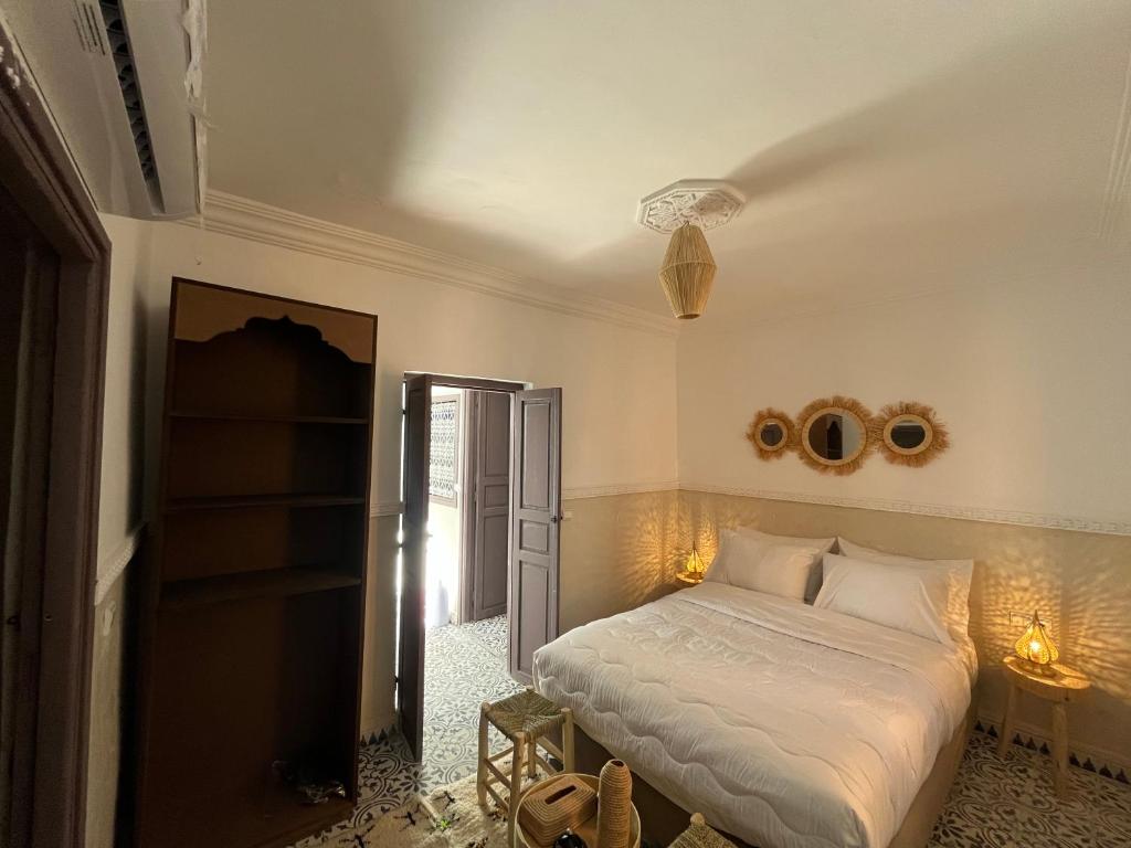 Postel nebo postele na pokoji v ubytování Riad Tarba & Spa